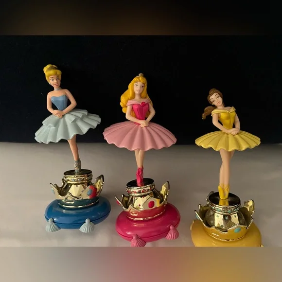 Disney princess windup tops Belle, Cinderella and Sleeping Beauty